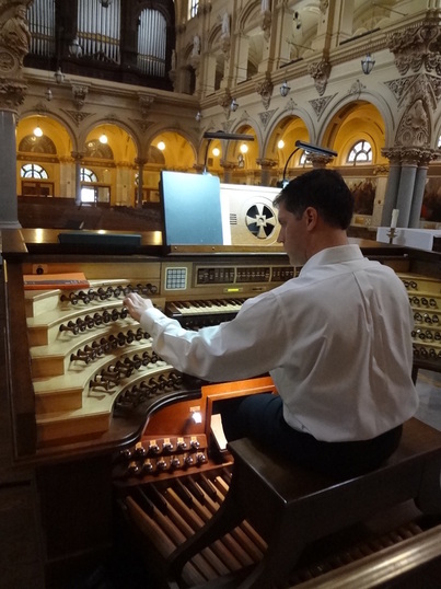 James Lake, organist and music director, at the organ console.